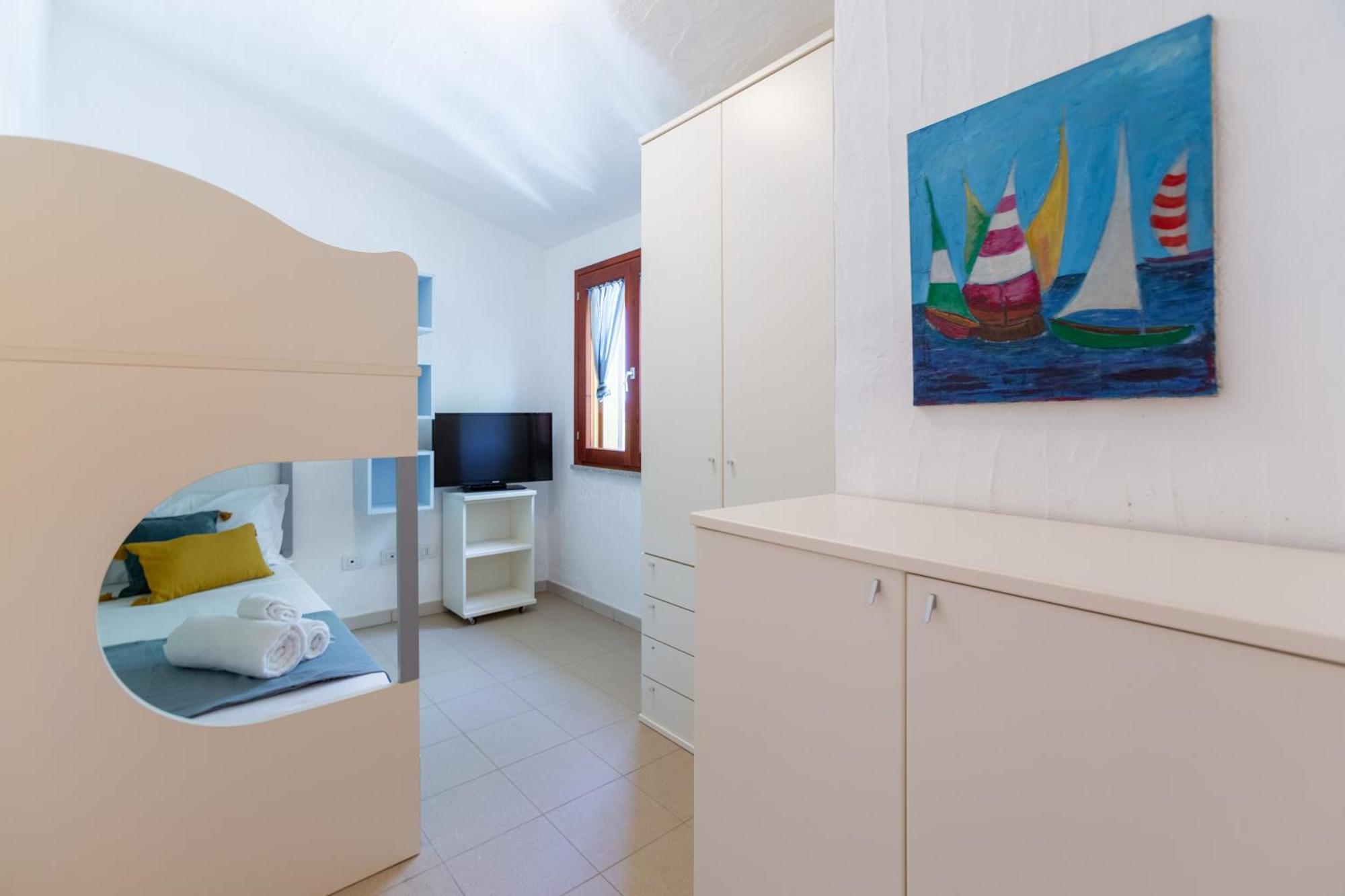 Holiday home Porto Pino, Garden And Pool