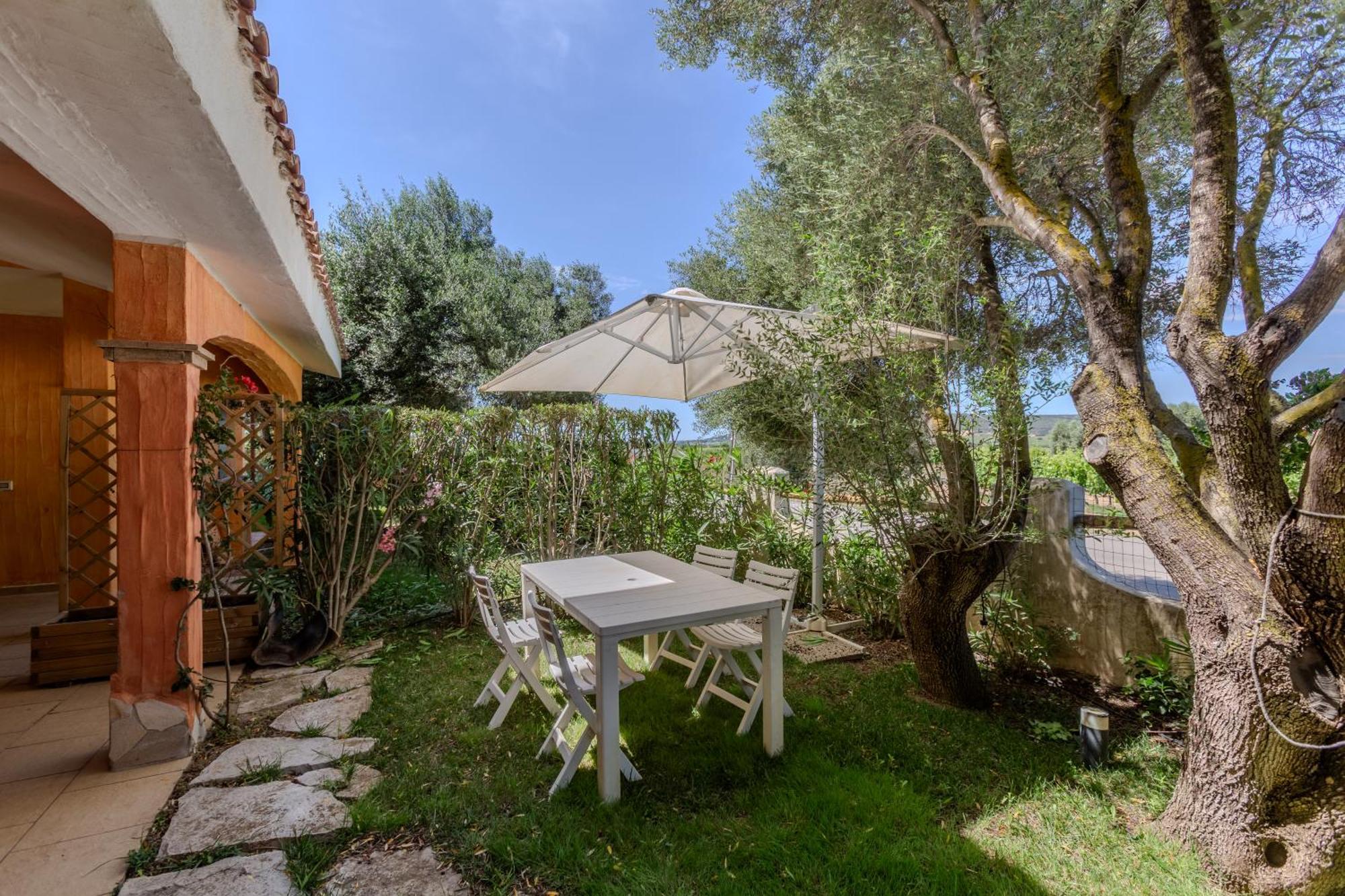 Holiday home Porto Pino, Garden And Pool